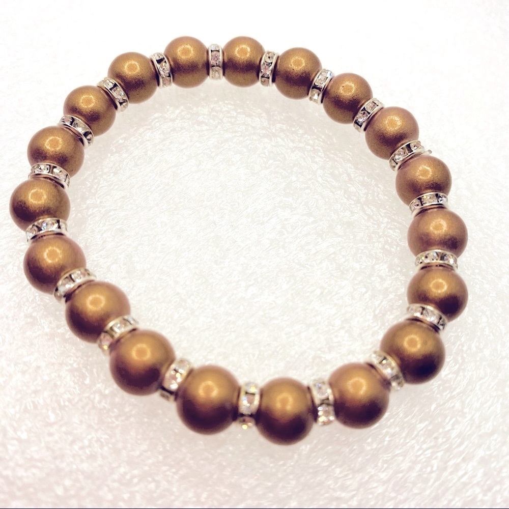 Bracelet bronze goldfish color with Crystals! Looks different in differe…
